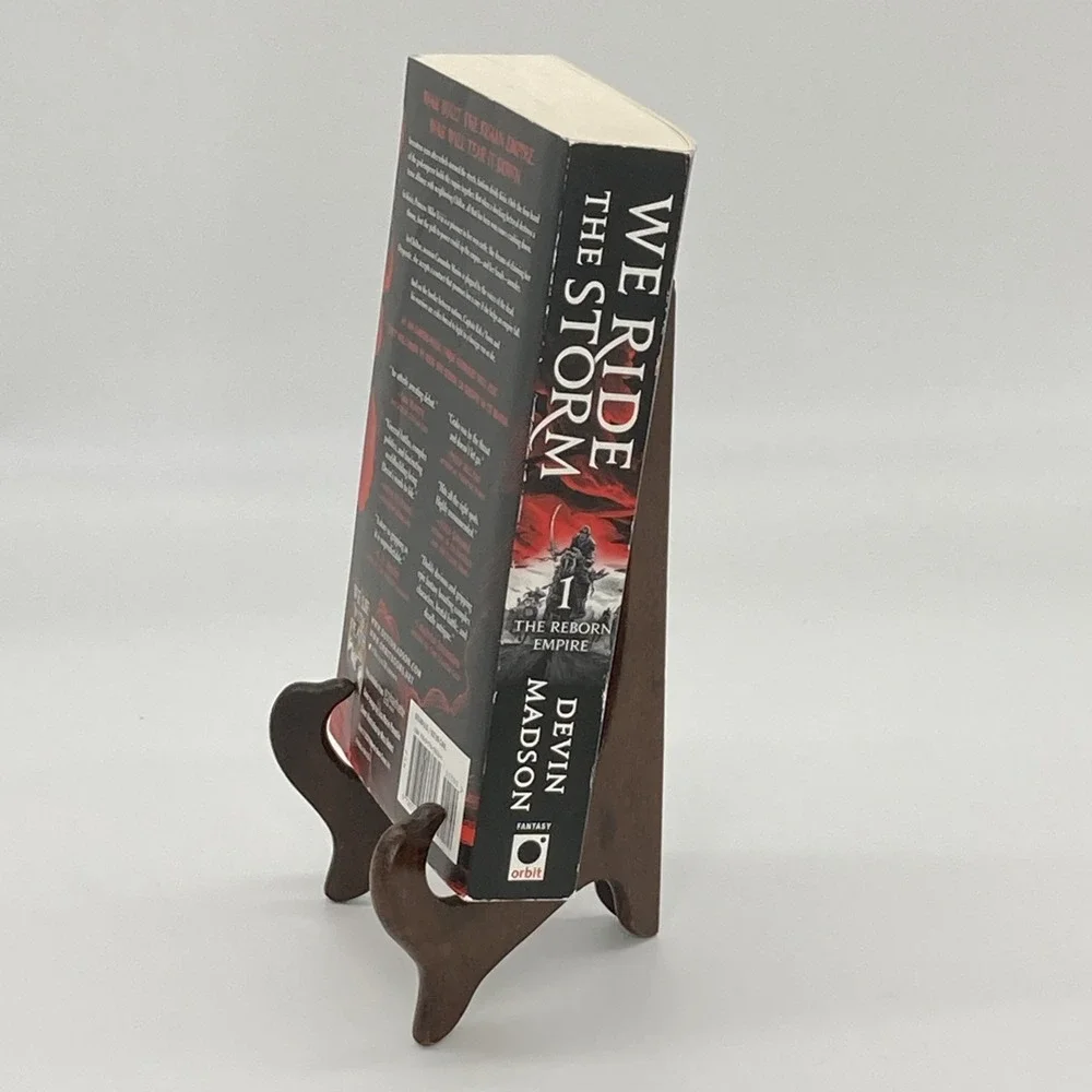 We Ride the Storm: The Reborn Empire #1 by Devin Madson paperback, Fantasy novel